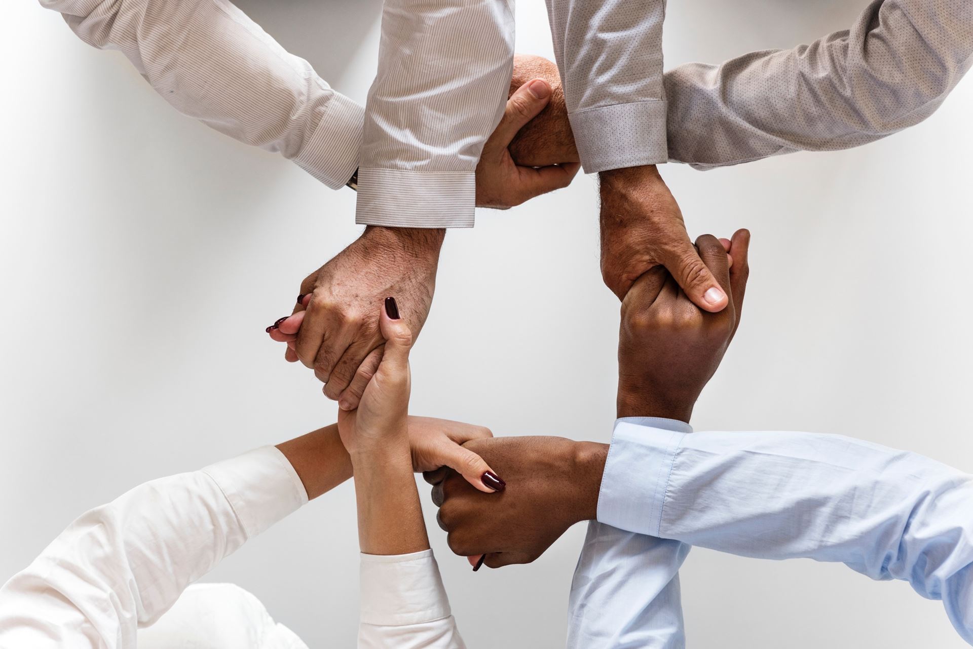 a man holding his hands up